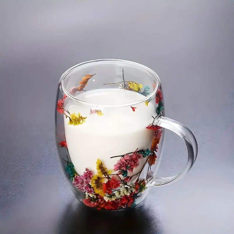 Close-up of flower details on glass mug